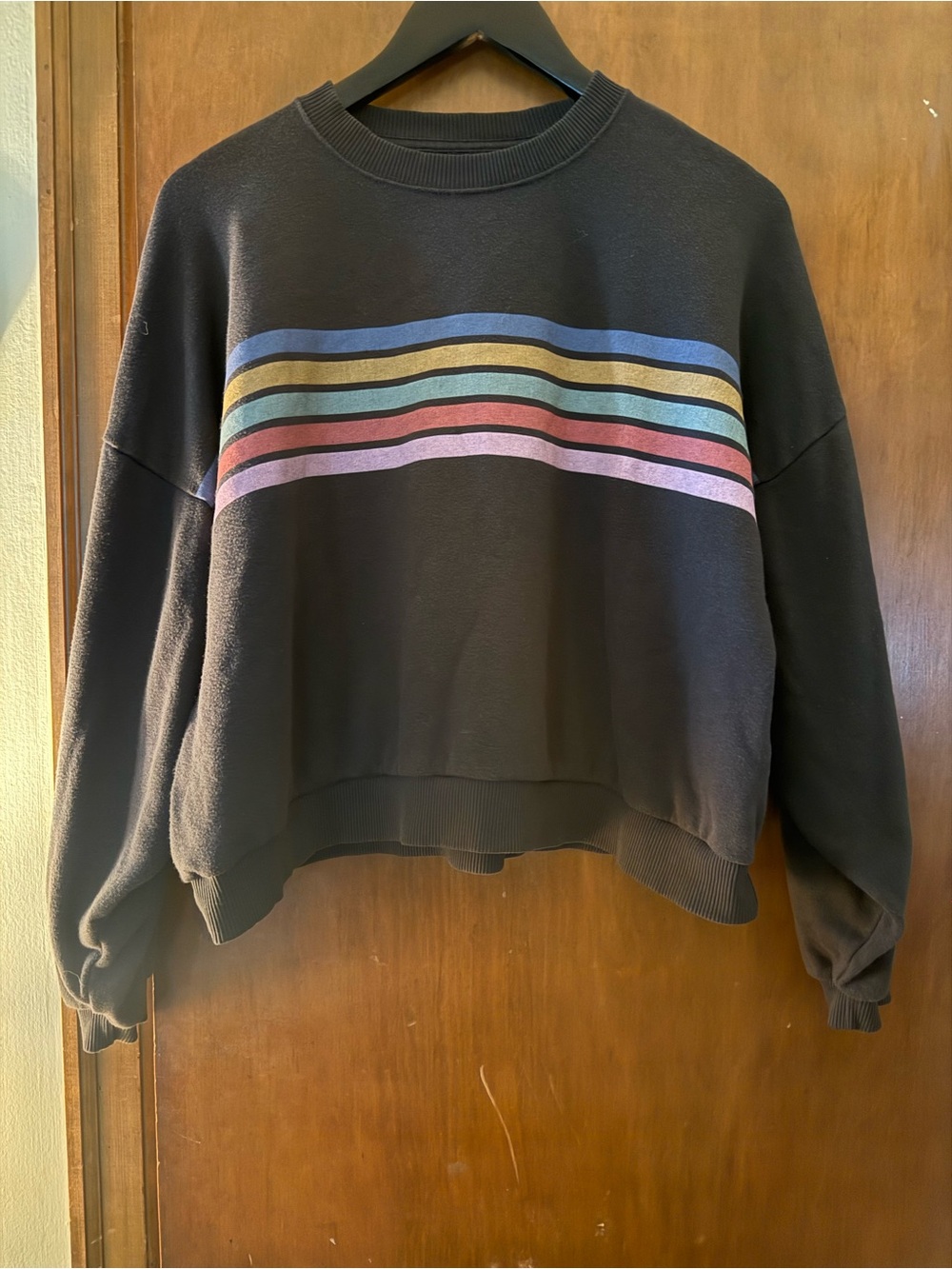 American Eagle Outfitters Black Crewneck Sweatshirt with Multicolor Stripes.
